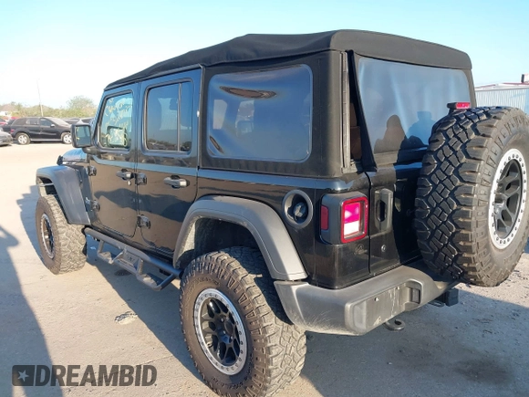 2018 Jeep Wrangler Unlimited Sport S z VIN 1C4HJXDG9JW169478, wystawiony jako IAAI lot #40387425 z przebiegiem 59 287 mil mil oraz . Historia ofert i sprzedaży dostępna na DreamBid. Obrazek 3.