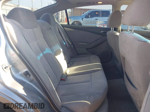2007 Nissan Altima S with VIN 1N4AL21E97C199596, listed as a IAAI auction lot 41880234 with 170,155 mi miles and . Bid and sale history available at DreamBid. Image 8.