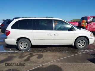 2001 Dodge Grand Caravan with VIN 2B4GT44L11R179428, listed as a IAAI auction lot 41648424 with 179,241 mi miles and . Bid and sale history available at DreamBid. Image 13.