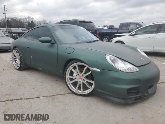 1999 Porsche 911 z VIN WP0AA299XXS623462, wystawiony jako Copart lot #85549554 z przebiegiem Nie podano mil oraz Szkoda całkowita • Salvage title. Historia ofert i sprzedaży dostępna na DreamBid. Obrazek 4.