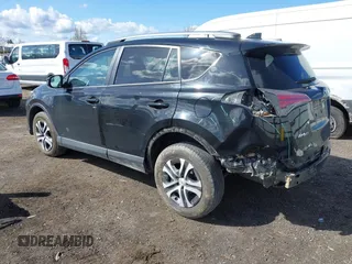 2018 Toyota RAV4 LE with VIN 2T3BFREV2JW749735, listed as a IAAI auction lot 41998068 with 112,468 mi miles. Bid and sale history available at carsss.com. Image 3.