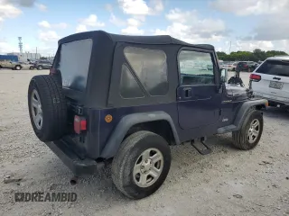 1998 Jeep Wrangler SE with VIN 1J4FY29P6WP705491, listed as a Copart auction lot 61873695 with 195,678 mi miles and Clean title. Bid and sale history available at DreamBid. Image 3.
