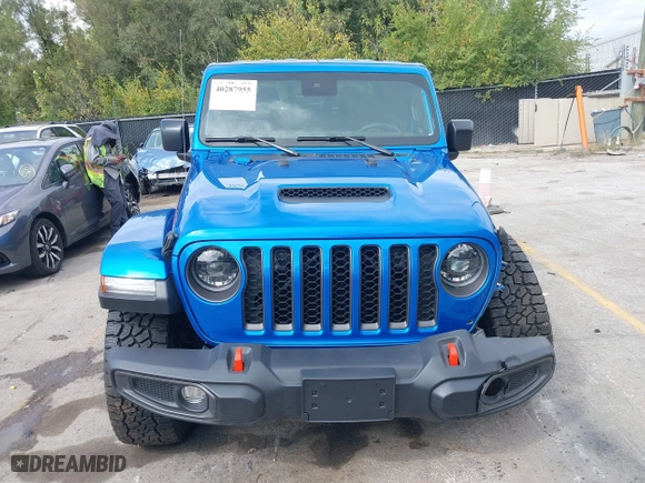 2023 Jeep Gladiator Mojave with VIN 1C6JJTEG0PL593061, listed as a IAAI auction lot 40287955 with 3,930 mi miles. Bid and sale history available at carsss.com. Image 13.