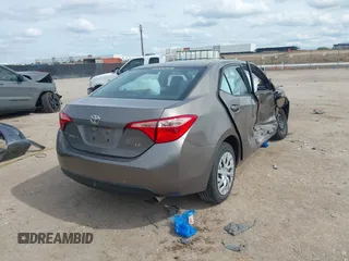 2018 Toyota Corolla L with VIN 2T1BURHE1JC983389, listed as a IAAI auction lot 42221142 with 79,113 mi miles and . Bid and sale history available at DreamBid. Image 4.