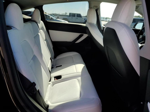 2022 Tesla Model Y Performance with VIN 7SAYGDEF5NF337004, listed as a Copart auction lot 85801004 with 24,945 mi miles and Salvage Title. Bid and sale history available at carsss.com. Image 11.