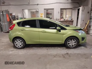 2013 Ford Fiesta SE with VIN 3FADP4EJ9DM131913, listed as a IAAI auction lot 41677333 with 54,673 mi miles. Bid and sale history available at carsss.com. Image 13.