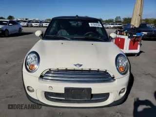 2014 MINI Convertible z VIN WMWZN3C5XET569992, wystawiony jako Copart lot #81044304 z przebiegiem 132 967 mil mil oraz Czysty tytuł • Clean title. Historia ofert i sprzedaży dostępna na DreamBid. Obrazek 5.