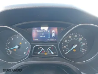 2014 Ford Focus SE with VIN 1FADP3F27EL215930, listed as a IAAI auction lot 41282263 with 130,324 mi miles. Bid and sale history available at carsss.com. Image 7.