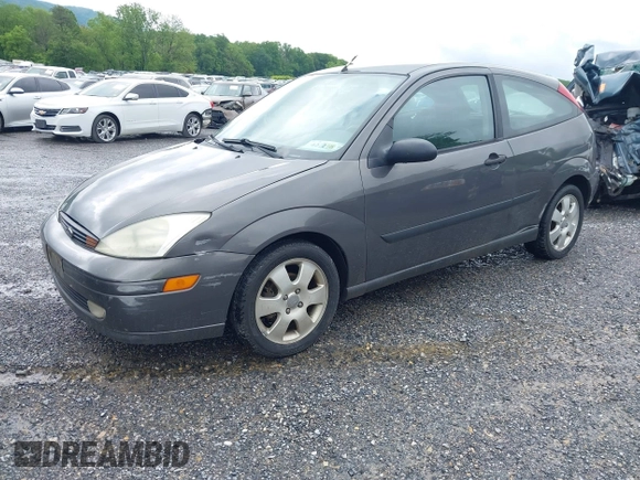 2002 Ford Focus ZX3 with VIN 3FAFP31322R232138, listed as a IAAI auction lot 42253174 with 178,405 mi miles and . Bid and sale history available at DreamBid. Image 2.