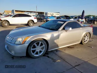 2006 Cadillac XLR z VIN 1G6YV36A465602551, wystawiony jako Copart lot #54019215 z przebiegiem 127 352 mil mil oraz Tytuł czysty. Historia ofert i sprzedaży dostępna na DreamBid. Obrazek 1.