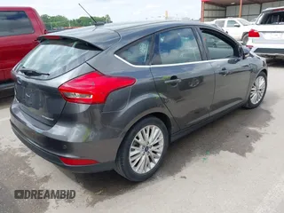 2018 Ford Focus Titanium with VIN 1FADP3N28JL323825, listed as a IAAI auction lot 42341286 with 46,565 mi miles and . Bid and sale history available at DreamBid. Image 4.