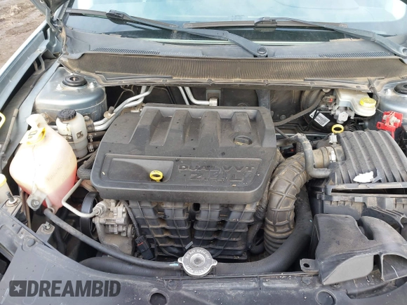 2009 Dodge Avenger SXT with VIN 1B3LC56B09N522736, listed as a IAAI auction lot 41195477 with 100,977 mi miles and . Bid and sale history available at DreamBid. Image 10.