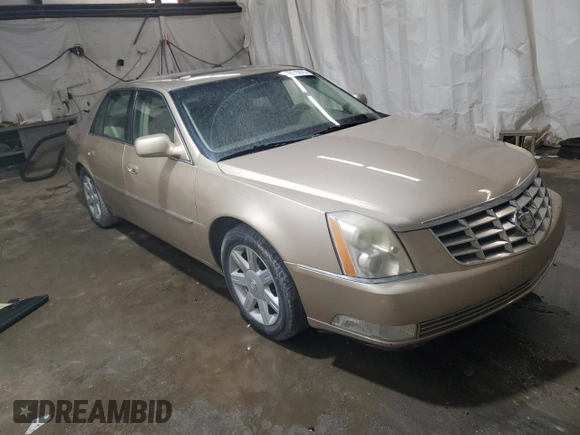 2006 Cadillac DTS 1SC z VIN 1G6KD57Y76U141402, wystawiony jako Copart lot #58715675 z przebiegiem 148 042 mil mil oraz Szkoda całkowita • Salvage title. Historia ofert i sprzedaży dostępna na DreamBid. Obrazek 4.