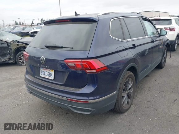 2022 Volkswagen Tiguan SE with VIN 3VV3B7AX0NM018659, listed as a IAAI auction lot 42076655 with 32,326 mi miles and . Bid and sale history available at DreamBid. Image 4.