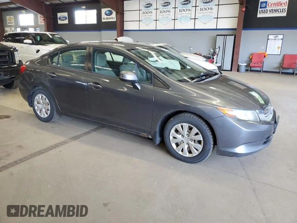 2012 Honda Civic LX z VIN 2HGFB2F59CH313357, wystawiony jako Copart lot #59526905 z przebiegiem 253 322 mil mil oraz Czysty tytuł • Clean title. Historia ofert i sprzedaży dostępna na DreamBid. Obrazek 4.