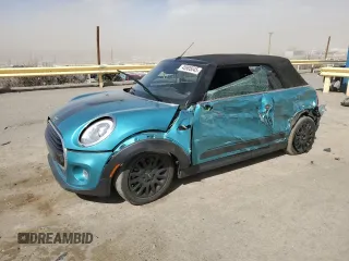 2018 MINI Convertible Cooper with VIN WMWWG5C5XJ3D00672, listed as a Copart auction lot 45905045 with 73,554 mi miles and Salvage Title. Bid and sale history available at DreamBid. Image 1.