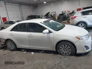 2014 Toyota Camry L with VIN 4T1BF1FK4EU763009, listed as a IAAI auction lot 41615134 with 165,293 mi miles and . Bid and sale history available at carsss.com. Image 13.