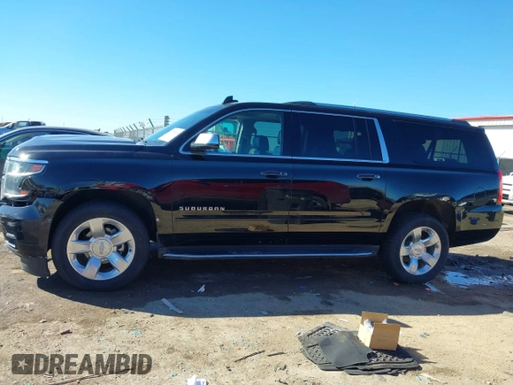 2018 Chevrolet Suburban Premier z VIN 1GNSCJKC5JR386545, wystawiony jako IAAI lot #41684349 z przebiegiem 130 511 mil mil oraz . Historia ofert i sprzedaży dostępna na DreamBid. Obrazek 14.