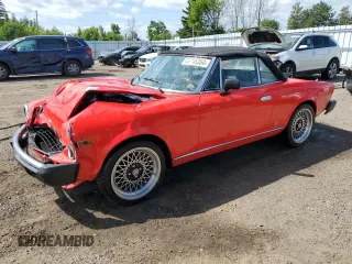 1979 FIAT 124 Spider z VIN 124CS20142625, wystawiony jako Copart lot #63245354 z przebiegiem 41 509 mil mil oraz Tytuł czysty. Historia ofert i sprzedaży dostępna na DreamBid. Obrazek 1.