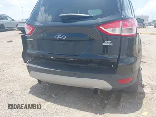2013 Ford Escape SE with VIN 1FMCU9GX0DUC42483, listed as a IAAI auction lot 42549857 with 138,028 mi miles and . Bid and sale history available at DreamBid. Image 17.