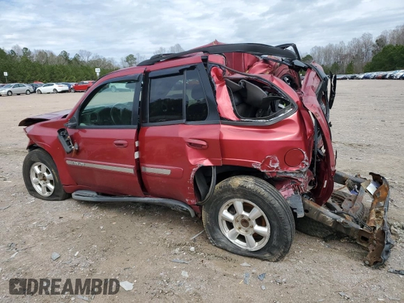 2003 GMC Envoy SLE with VIN 1GKDT13S332136423, listed as a Copart auction lot 49301635 with 148,669 mi miles and Salvage Title. Bid and sale history available at carsss.com. Image 2.