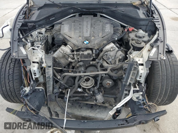 2013 BMW X5 xDrive50i with VIN 5UXZV8C52D0C15370, listed as a Copart auction lot 62293645 with 90,611 mi miles and Clean title. Bid and sale history available at DreamBid. Image 12.