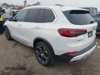 2021 BMW X5 sDrive40i with VIN 5UXCR4C0XM9F73416, listed as a IAAI auction lot 41722856 with 25,115 mi miles. Bid and sale history available at carsss.com. Image 3.