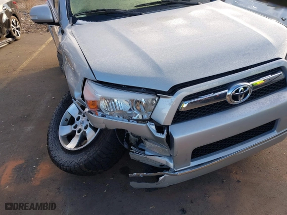 2012 Toyota 4Runner SR5 with VIN JTEBU5JR6C5102512, listed as a IAAI auction lot 41291233 with 164,476 mi miles. Bid and sale history available at carsss.com. Image 6.