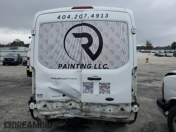 2016 Ford Transit Cargo with VIN 1FTYR2CG9GKA15172, listed as a Copart auction lot 87537575 with 214,227 mi miles and Salvage title. Bid and sale history available at DreamBid. Image 6.