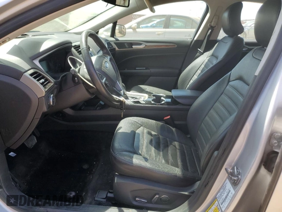 2015 Ford Fusion SE z VIN 3FA6P0HD0FR212294, wystawiony jako Copart lot #55563145 z przebiegiem 49 750 mil mil oraz Szkoda całkowita • Salvage title. Historia ofert i sprzedaży dostępna na DreamBid. Obrazek 7.