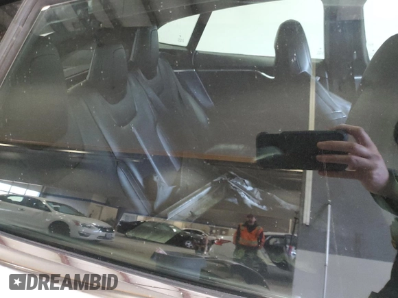 2015 Tesla Model S 85D with VIN 5YJSA1E4XFF110720, listed as a Copart auction lot 48694825 with Not Provided miles and Salvage Title. Bid and sale history available at carsss.com. Image 11.