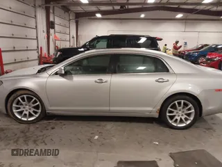 2012 Chevrolet Malibu LTZ with VIN 1G1ZG5E77CF375464, listed as a IAAI auction lot 41509140 with 197,329 mi miles and . Bid and sale history available at DreamBid. Image 14.