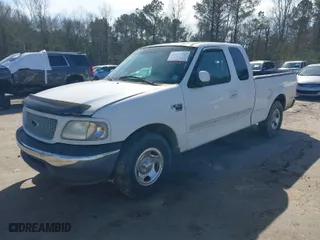 1999 Ford F-150 Work Series with VIN 1FTRX17W6XNB61503, listed as a IAAI auction lot 41627183 with 277,498 mi miles. Bid and sale history available at carsss.com. Image 2.