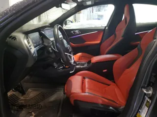 2021 BMW 2 Series M235i xDrive with VIN WBA13AL07M7G77699, listed as a Copart auction lot 89232885 with 52,210 mi miles and Salvage Title. Bid and sale history available at DreamBid. Image 7.