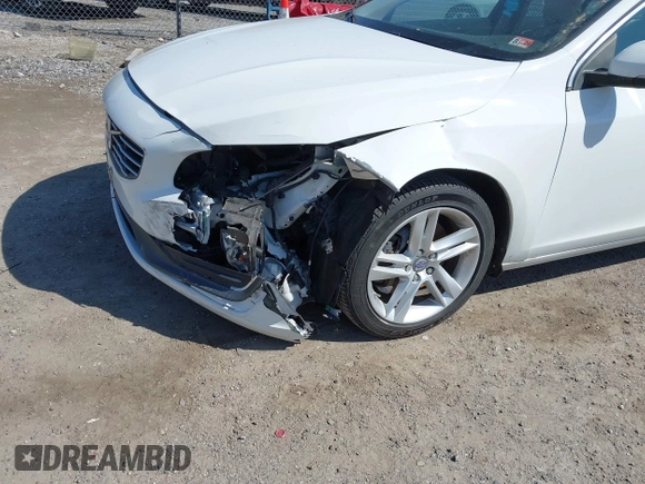 2014 Volvo S60 T5 с VIN YV1612FS1E2297930, выставлен на аукционе IAAI как лот 41906564 с пробегом 88 843 миль миль и . История ставок и продаж доступна на DreamBid. Изображение 6.