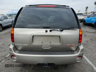 2003 GMC Envoy SLE with VIN 1GKDS13S232236886, listed as a Copart auction lot 43220545 with 58,229 mi miles and Salvage Title. Bid and sale history available at carsss.com. Image 6.