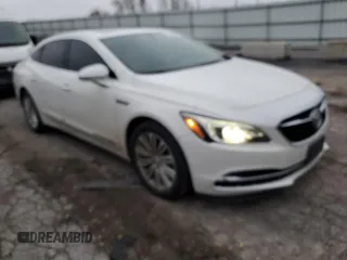 2020 Buick LaCrosse Essence with VIN 1G4ZP5SZ7JU130553, listed as a Copart auction lot 77581973 with 150,270 mi miles and Salvage Title. Bid and sale history available at carsss.com. Image 4.