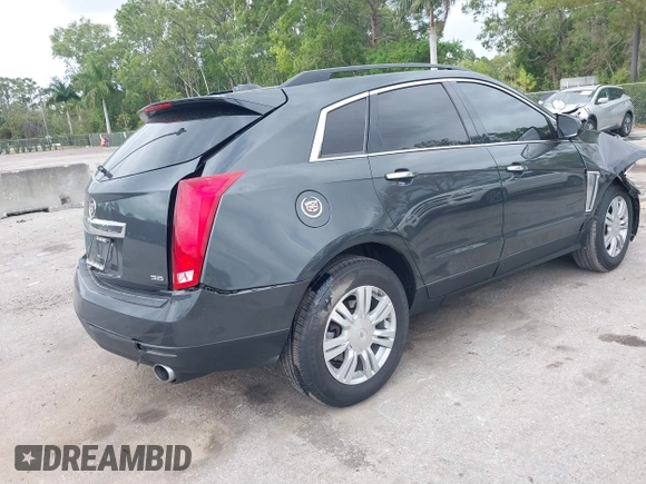 2015 Cadillac SRX with VIN 3GYFNAE30FS569009, listed as a IAAI auction lot 41718522 with 104,448 mi miles and . Bid and sale history available at DreamBid. Image 4.