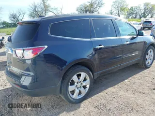 2016 Chevrolet Traverse LT z VIN 1GNKVGKD1GJ342152, wystawiony jako IAAI lot #42176937 z przebiegiem 76 739 mil mil oraz . Historia ofert i sprzedaży dostępna na DreamBid. Obrazek 4.