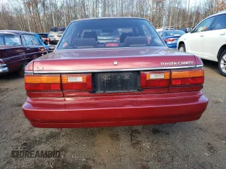 1989 Toyota Camry LE ECT z VIN JT2SV22E5K0253163, wystawiony jako Copart lot #82913404 z przebiegiem 74 454 mil mil oraz Szkoda całkowita • Salvage title. Historia ofert i sprzedaży dostępna na DreamBid. Obrazek 6.