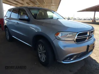 2015 Dodge Durango SXT z VIN 1C4RDJAG7FC240103, wystawiony jako IAAI lot #42621514 z przebiegiem 197 257 mil mil oraz . Historia ofert i sprzedaży dostępna na DreamBid. Obrazek 1.