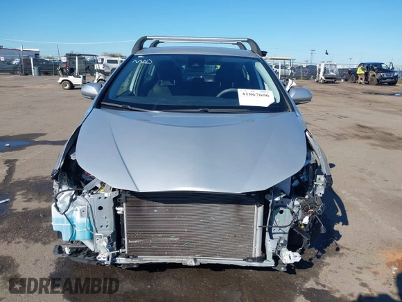 2021 Toyota Prius L Eco with VIN JTDKAMFU5M3130478, listed as a IAAI auction lot 41867606 with 52,223 mi miles. Bid and sale history available at carsss.com. Image 13.