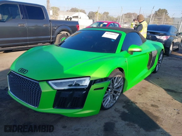 2017 Audi R8 z VIN WUAVACFX5H7903923, wystawiony jako IAAI lot #41348191 z przebiegiem 53 883 mil mil oraz . Historia ofert i sprzedaży dostępna na DreamBid. Obrazek 2.
