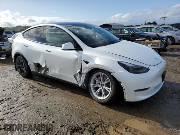 2023 Tesla Model Y Long Range with VIN 7SAYGDEEXPF844622, listed as a Copart auction lot 49094465 with 35,191 mi miles and Salvage Title. Bid and sale history available at DreamBid. Image 4.