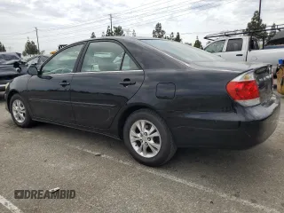 2006 Toyota Camry LE z VIN 4T1BF32K56U621741, wystawiony jako Copart lot #59577595 z przebiegiem 189 155 mil mil oraz Czysty tytuł • Clean title. Historia ofert i sprzedaży dostępna na DreamBid. Obrazek 2.