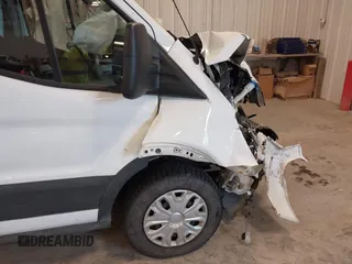 2020 Ford Transit Cargo with VIN 1FTBR1C82LKA59095, listed as a IAAI auction lot 40014706 with 116,057 mi miles and . Bid and sale history available at DreamBid. Image 6.