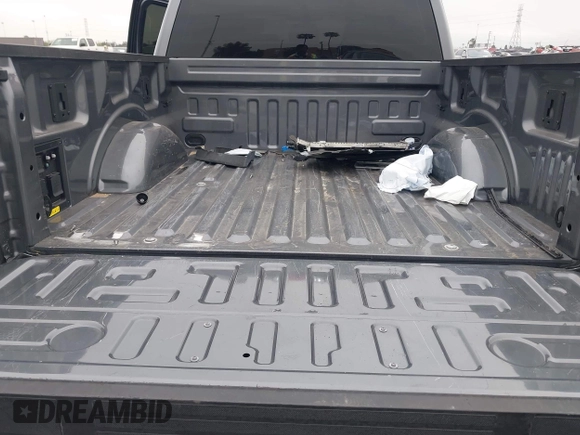 2023 Ford F-150 Lightning Pro with VIN 1FTVW1EL8PWG48559, listed as a IAAI auction lot 42033123 with 8,845 mi miles and . Bid and sale history available at DreamBid. Image 20.