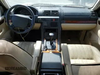 1998 Land Rover Range Rover z VIN SALPV1446WA398345, wystawiony jako Copart lot #74356224 z przebiegiem 128 510 mil mil oraz Czysty tytuł • Clean title. Historia ofert i sprzedaży dostępna na DreamBid. Obrazek 8.