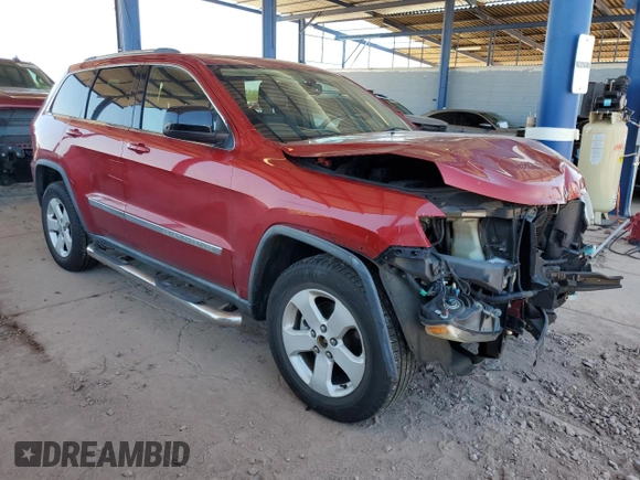 2011 Jeep Grand Cherokee Laredo with VIN 1J4RR4GG4BC511925, listed as a Copart auction lot 56251225 with 179,758 mi miles and Salvage title. Bid and sale history available at DreamBid. Image 4.