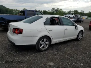 2009 Volkswagen Jetta SE with VIN 3VWRZ71K69M120110, listed as a Copart auction lot 64813905 with 114,552 mi miles and Salvage title. Bid and sale history available at DreamBid. Image 3.